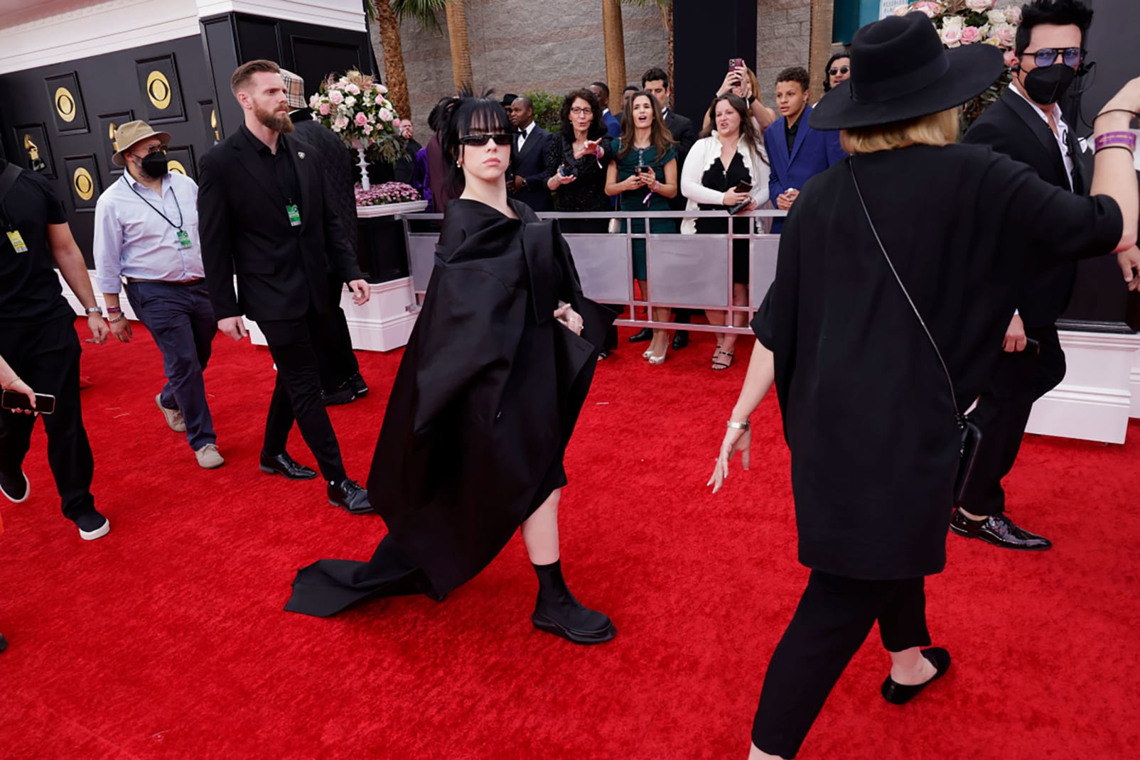 Billie Eilish kept it goth-chic in an edgy Rick Owens ensemble and shades. 