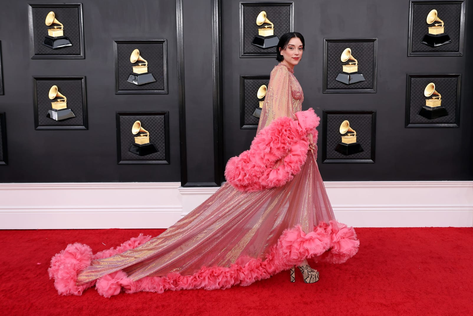 St. Vincent wore a shimmery Gucci gown with ruffled sleeves and trim.