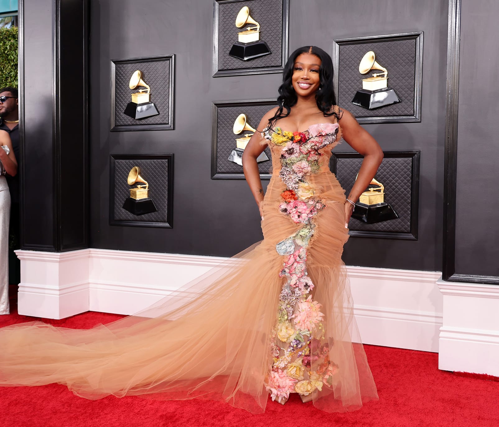 SZA stood out with a sheer, tulle Jean Paul Gaultier gown adorned with fllowers.