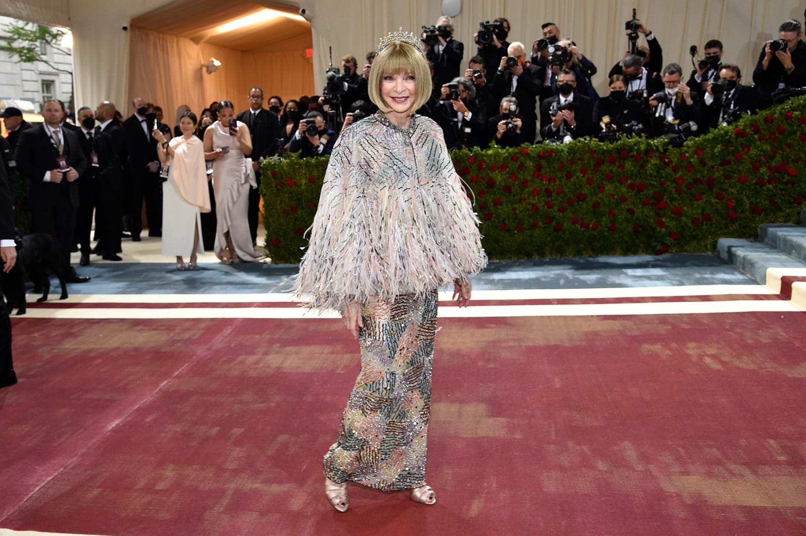 Vogue's Anna Wintour chose Chanel haute couture by Virginie Viard for the evening, but her outfit has a personal touch: a tiara from 1910 that's a family heirloom. 
