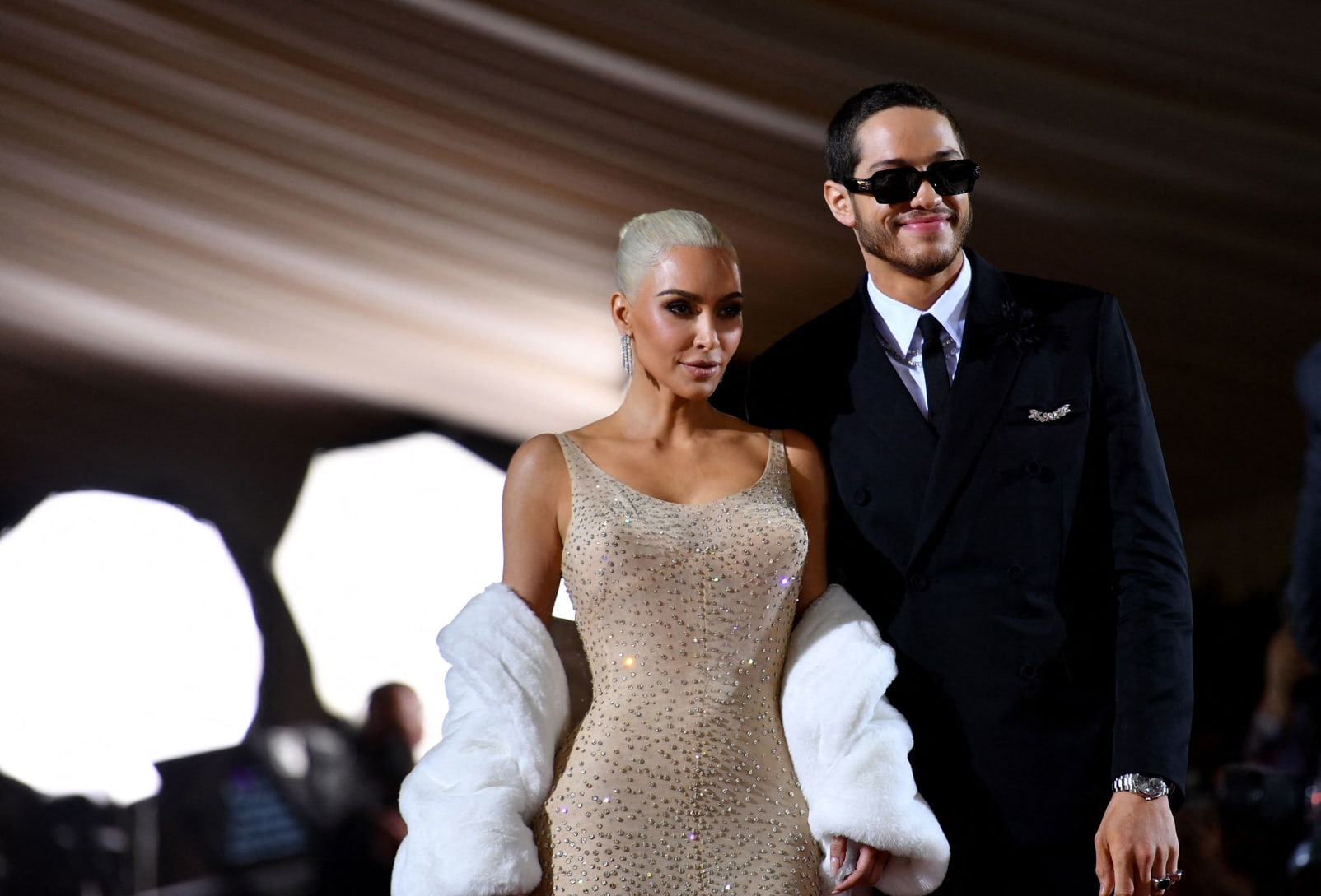 Kim Kardashian wore Marilyn Monroe's iconic dress -- the one she famously sang "Happy Birthday, Mr. President" in at John F. Kennedy's birthday fundraiser in 1962. Pete Davidson kept things simple in a suit and sunglasses. 