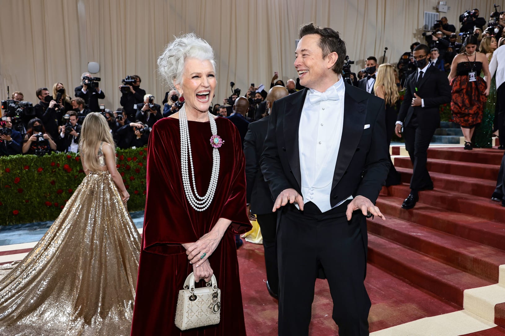 Elon Musk arrived in Tom Ford with his mother, the model Maye Musk,  who was wearing Dior.