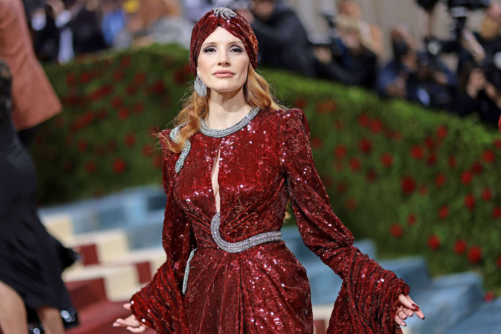 Jessica Chastain wore an embellished ruby Gucci gown with a matching turban. 