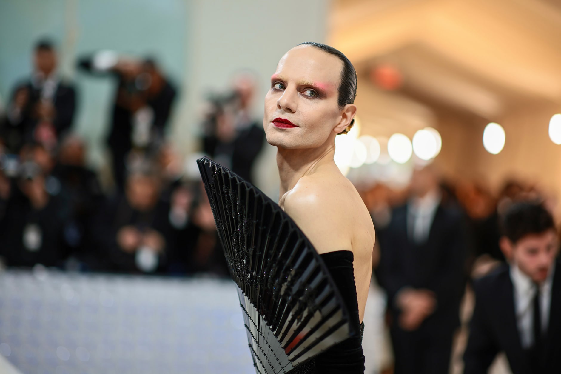 Broadway producer Jordan Roth paid homage to one of Lagerfeld's favorite accessories in this custom Schiaparelli look, with giant fan-shaped bodice.
