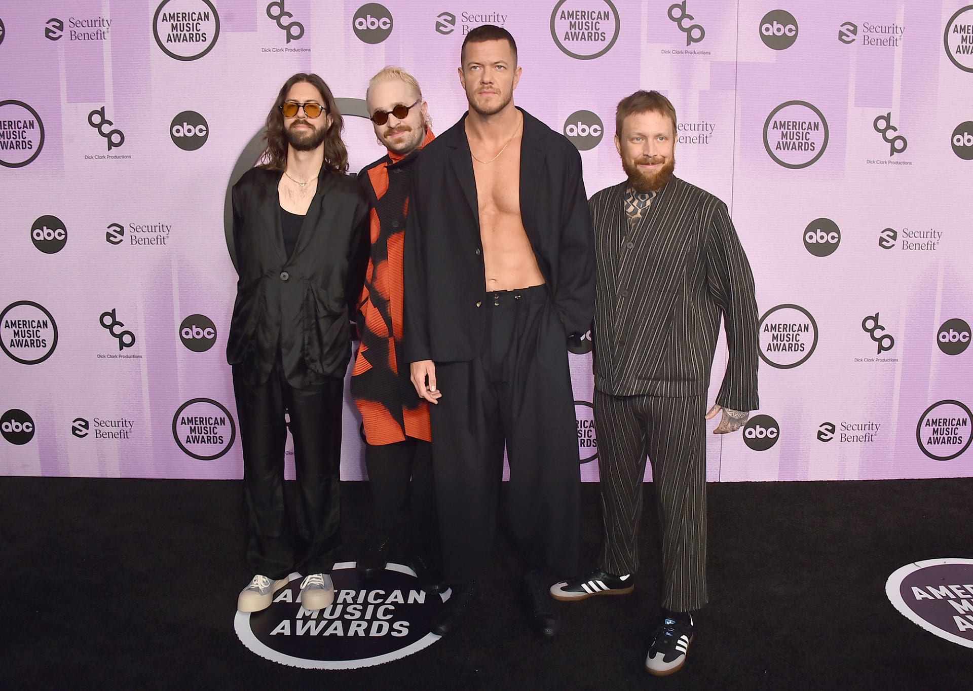 Imagine Dragons eschewed shirts on the red carpet ahead of the band's performance. 