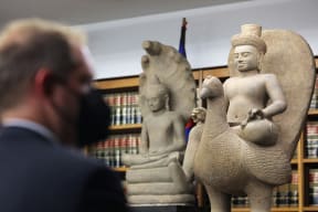 The 10th-century sandstone statue "Skanda on a Peacock" was among 30 items returned to Cambodia.