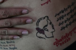 Myanmar Protesters Getting Permanent Symbols Of Resistance Tattoos Cnn Style