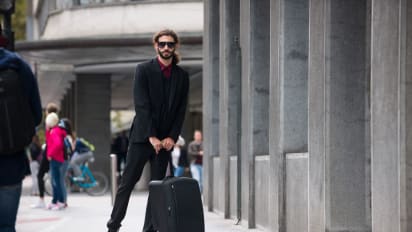 suitcase on scooter