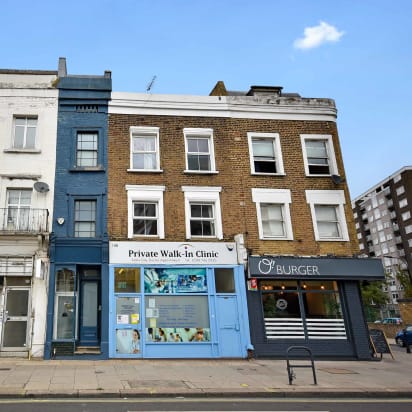The property sits between two shops in west London.