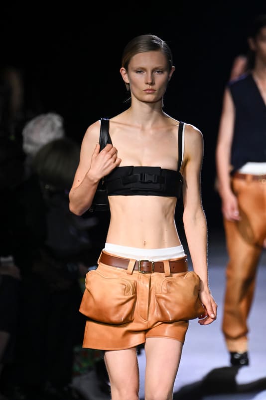 Prada expanded her vision of waist-band bandeaus from last season with a series of utility-belts-turned-bras.