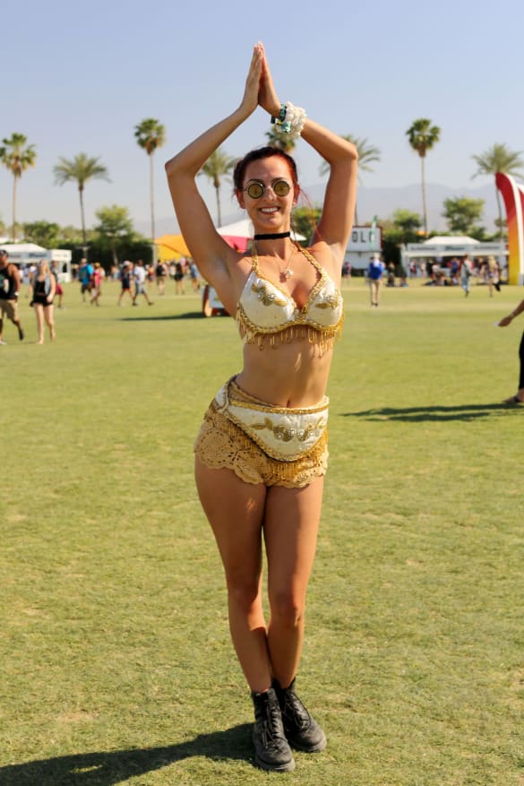 An attendee wears a fringed bikini to the 2015 edition.