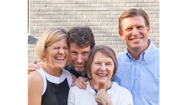 Sheryl, her brothers Tab and Greg Wilkins, and their mom in 2015.