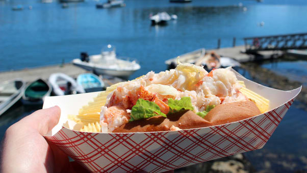 A classic Maine lobster roll served up on a dock by the Five Islands Lobster Co.