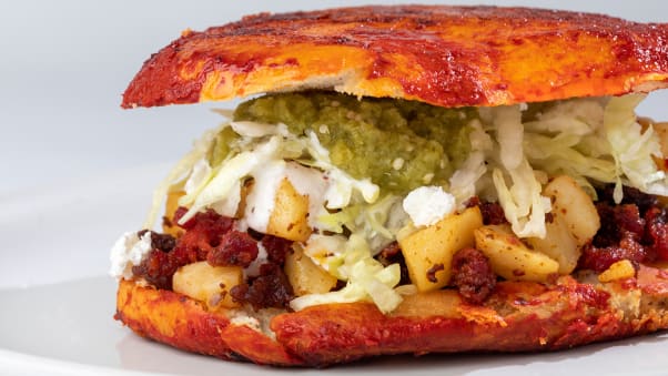 Mexico's pambazo is stuffed with potatoes and chorizo, among other goodies.