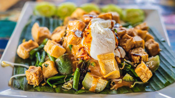 Gado gado features a mix of veggies in a thick, peanuty sauce.  