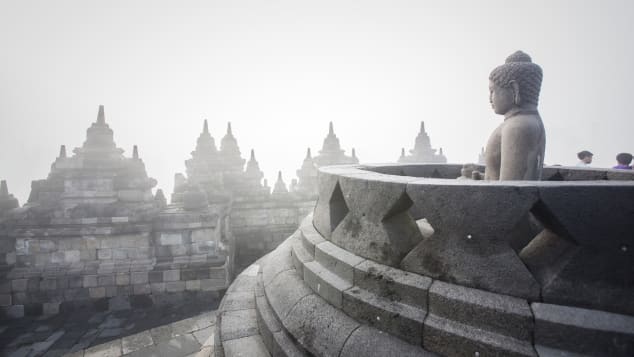 A Buddha statue at Indonesia's Borobudur Temple. 