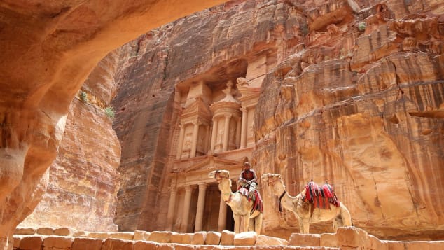  A Jordanian Bedouin sits on a camel in front of the Treasury Building in the ancient city of Petra in May 2016.