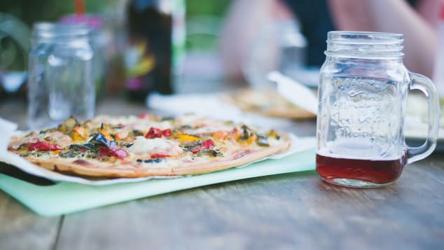 It wouldn't be a trip to Rome without a slice of pizza.