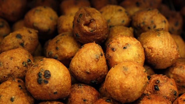 An oliebol is a doughnut-like product, traditionally made and consumed in the Netherlands during the New Year's celebrations.