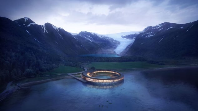 Il famoso ghiacciaio Svartisen, in lontananza, è il secondo più grande sulla terraferma norvegese.  L'hotel Svart si trova alle sue porte.  Spera di essere il primo hotel al mondo a essere positivo per l'energia quando aprirà nel 2021.
