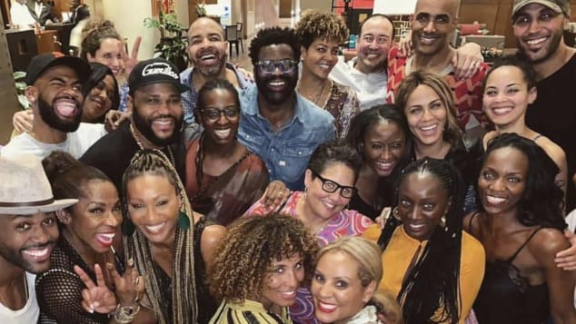 Attendees at the Full Circle Festival pose for a group photograph. 