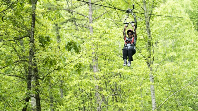 Lisa White zipped above the trees at Navitat. 