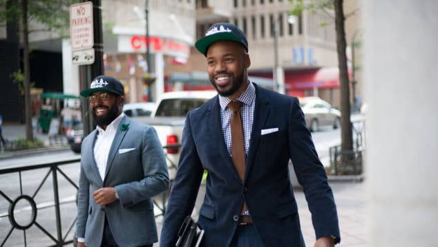 Kent Johnson (l) and Eric Martin are founders of an online campaign to reclaim the racial slur 'Go back to Africa' 