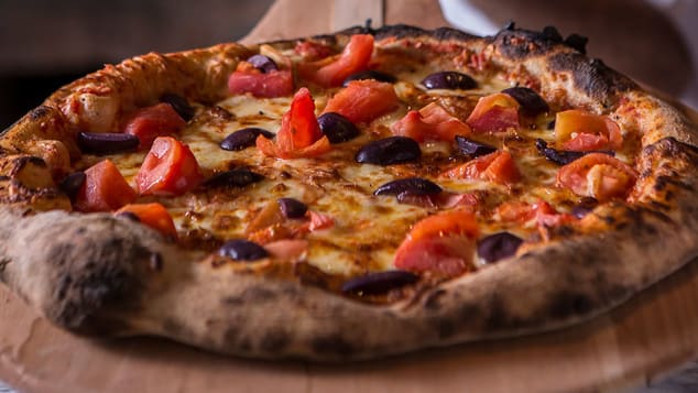 São Paulo-style pizza often bucks Italy's traditions in favor of copious cheese and more daring ingredients.