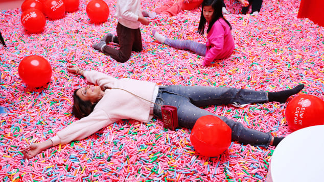 Bethenny Frankel (founder of Skinnygirl cocktails and "Real Housewife of New York" star) makes sprinkle-angels during a recent visit to the Museum of Ice Cream's SoHo flagship. 
