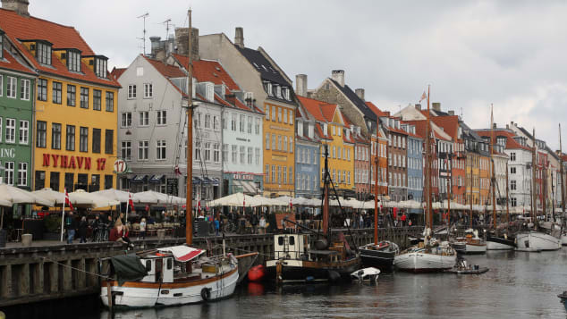 Colorful houses along canals help make Copenhagen a happy place for its residents as well as its visitors. Ludovic Marin/AFP/Getty Images