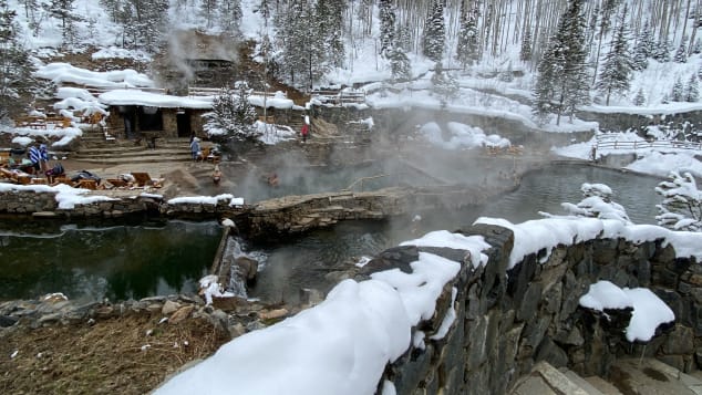 The lower hot pool butts up against the cold water creek, where participants can 'cool off' in 40-degree water. 