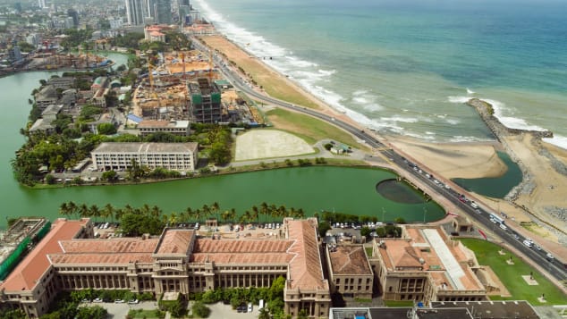 Beaches line the urban waterfront of Colombo, home to Sri Lanka's national and executive bodies of government.