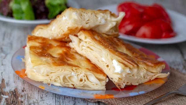 This savory pastry is made by layering sheets of a dough named "yufka" and adding a filling of white cheese