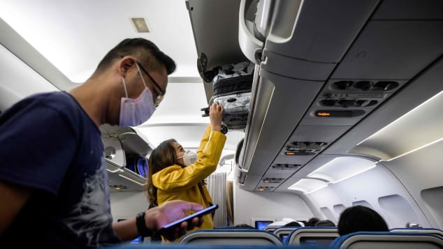 Harvard researchers described wearing masks as a critical part of keeping travelers safe in aircraft cabins, but stopped short of calling for a government mask mandate onboard flights. 