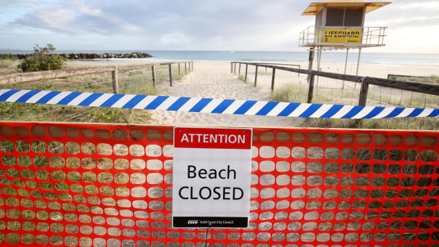 The beaches are closed and travelers and international arrivals into Australia are being sent to mandatory quarantine in hotels for 14 days. 