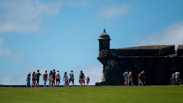 Tourist visit El Morro fort in San Juan just before the coronavirus pandemic. 