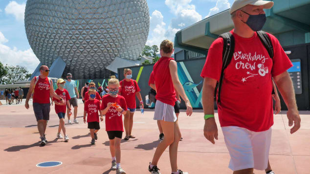 Guests arrive to attend the official reopening day of Epcot on July 15.