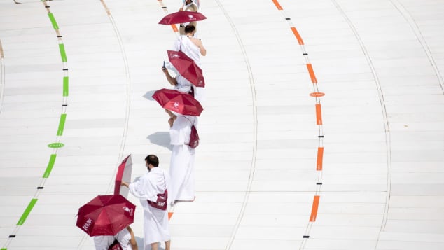 A reduced number of pligrims take part in the Hajj in Mecca.