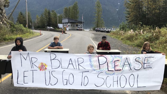 The border restrictions have left schoolchildren in Hyder, Alaska, unable to get to their school in Stewart, British Columbia.