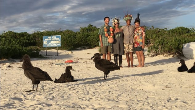 The four-person crew works at Kure Atoll. 