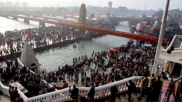 Indian Hindu devotees gather at the River Ganges during Makar Sankranti, a day considered to be of great religious significance in Hindu mythology, on January 14, 2021.