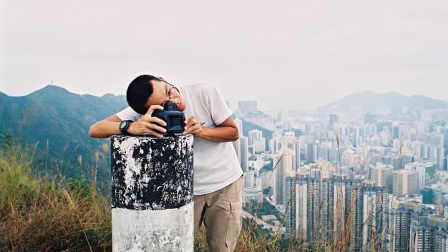 Simon Wan climbed every hill and island in Hong Kong