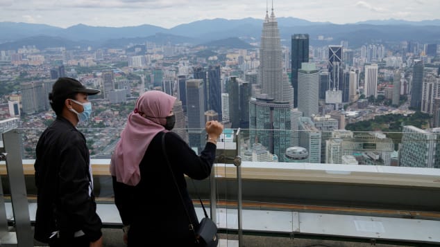 Tourists on the observation deck at Kuala Lumpur Tower in Malaysia on October 1. 