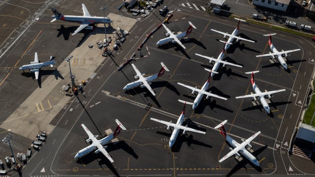 Air travel shut down in 2020 amid the Covid-19 pandemic. Pictured here: grounded Qantas planes at Sydney Airport in April 2020.