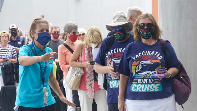 Passengers check into their cruise in Fort Lauderdale, Florida, on June 26, 2021. Celebrity Edge was the first cruise ship to leave a U.S. port since the coronavirus pandemic brought the industry to a 15-month standstill. 