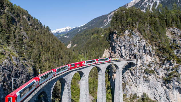 Switzerland's Bernina Express connects the fancy alpine resort of St. Moritz with Tirano in Italy.
