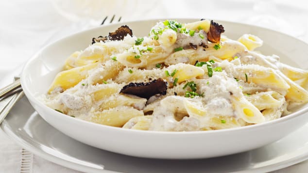 Penne alla norcina has pasta, cream and sausages, all mixed for a delicious dish.