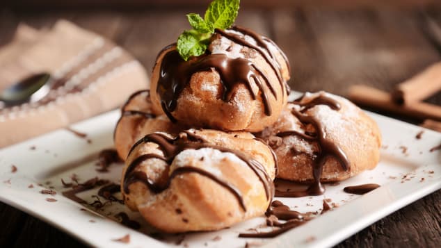 Profiteroles: What's better than a cream puff? A cream puff covered with chocolate.