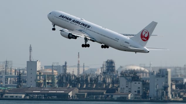 A Japan Airlines  passenger jet takes off from Haneda Airport in Tokyo. The Japanese government gives its citizens explicit instructions on what to do if caught in an active shooter incident in the United States.