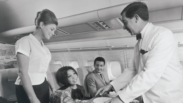 Sunday roast is carved for passengers in first class on a BOAC VC10 in 1964.